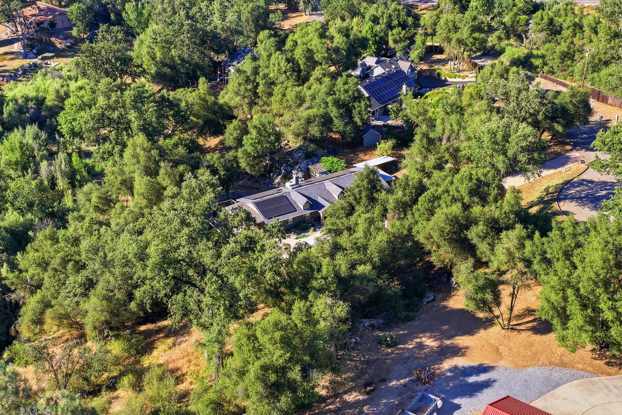Aerial view of Deer Creek Retreat nestled among Sierra trees
