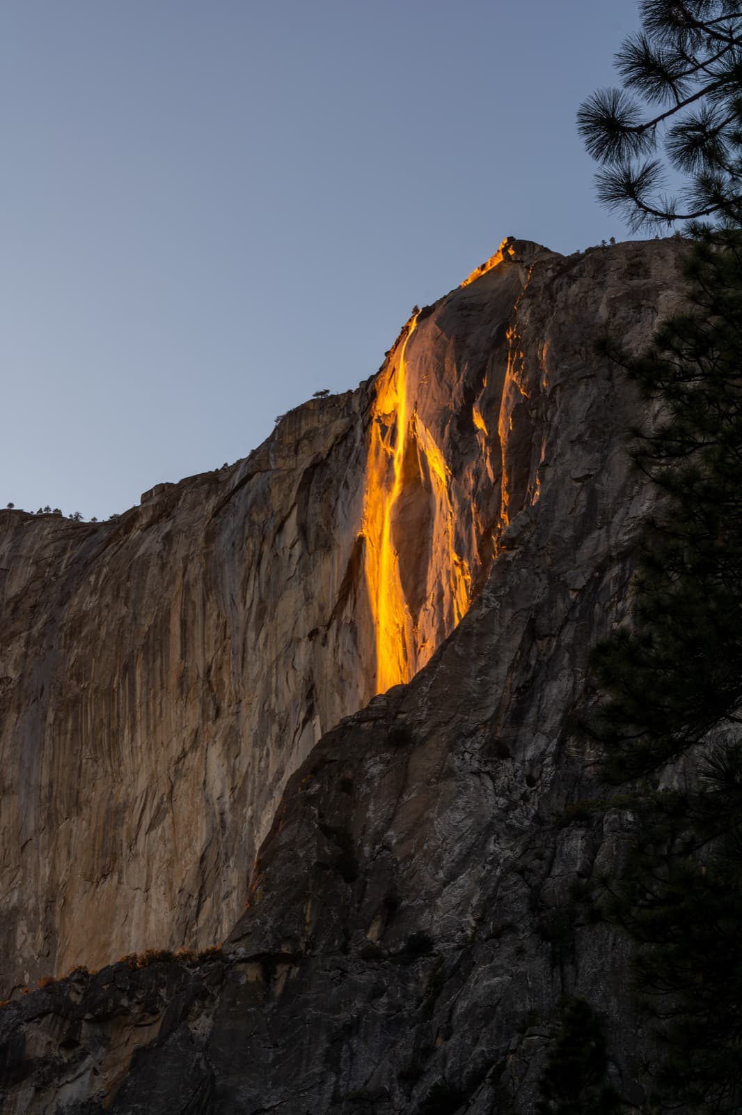Horsetail Fall glowing orange like a firefall on El Capitan at sunset