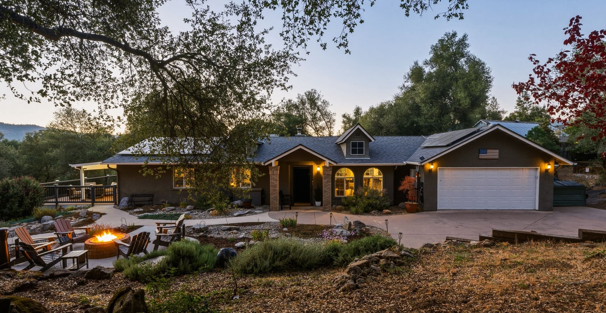 Front exterior of Deer Creek Retreat at sunset